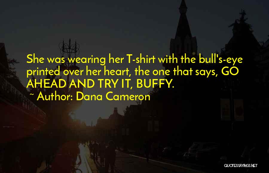 Dana Cameron Quotes: She Was Wearing Her T-shirt With The Bull's-eye Printed Over Her Heart, The One That Says, Go Ahead And Try