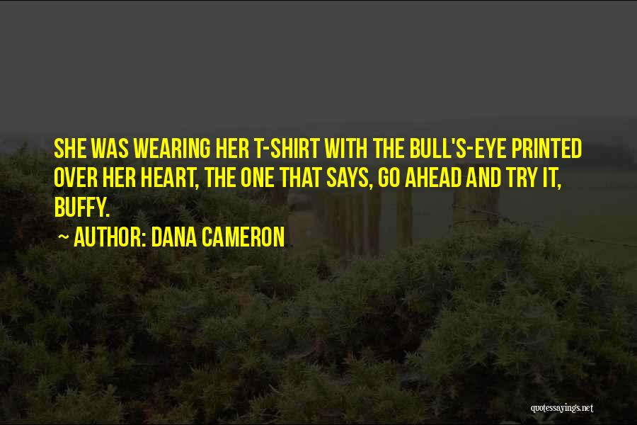 Dana Cameron Quotes: She Was Wearing Her T-shirt With The Bull's-eye Printed Over Her Heart, The One That Says, Go Ahead And Try