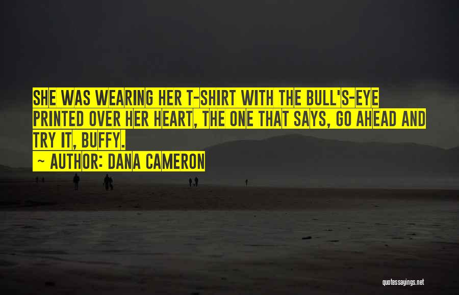 Dana Cameron Quotes: She Was Wearing Her T-shirt With The Bull's-eye Printed Over Her Heart, The One That Says, Go Ahead And Try