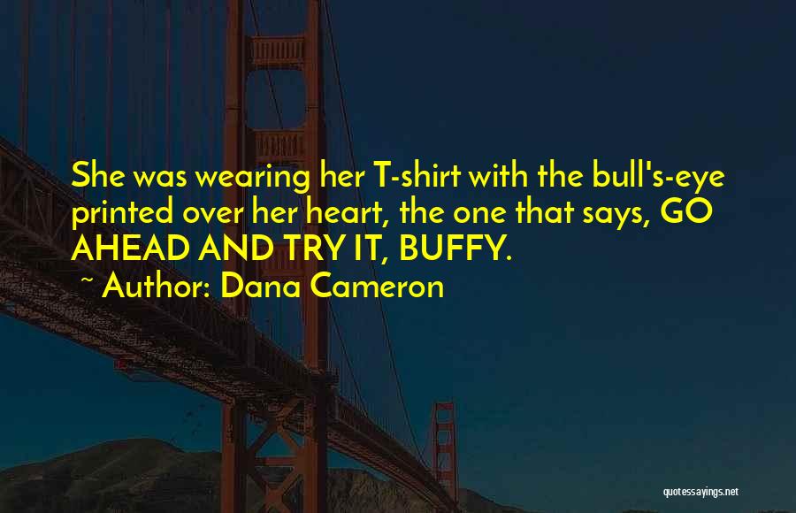 Dana Cameron Quotes: She Was Wearing Her T-shirt With The Bull's-eye Printed Over Her Heart, The One That Says, Go Ahead And Try