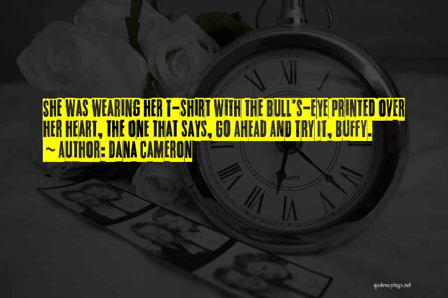 Dana Cameron Quotes: She Was Wearing Her T-shirt With The Bull's-eye Printed Over Her Heart, The One That Says, Go Ahead And Try