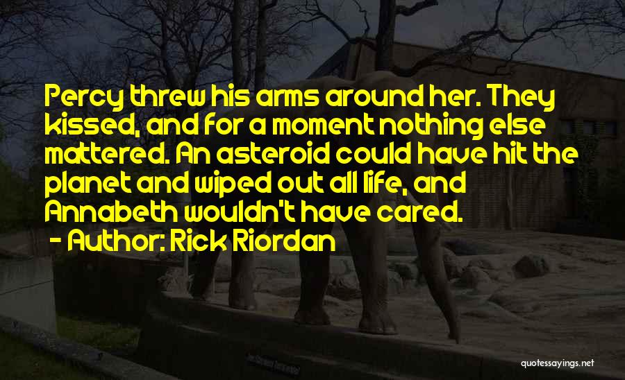 Rick Riordan Quotes: Percy Threw His Arms Around Her. They Kissed, And For A Moment Nothing Else Mattered. An Asteroid Could Have Hit