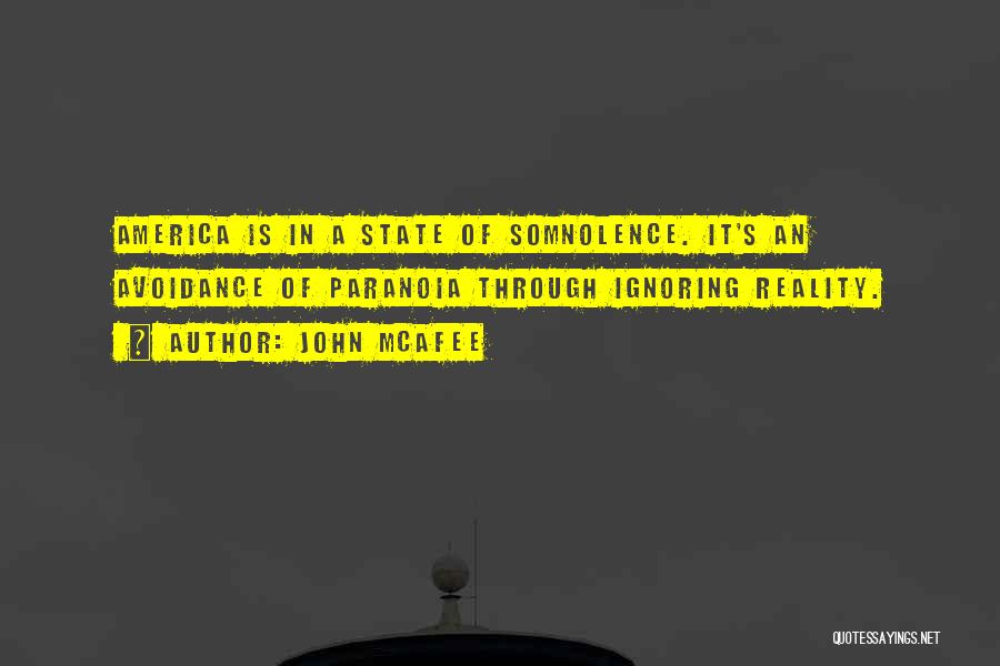 John McAfee Quotes: America Is In A State Of Somnolence. It's An Avoidance Of Paranoia Through Ignoring Reality.