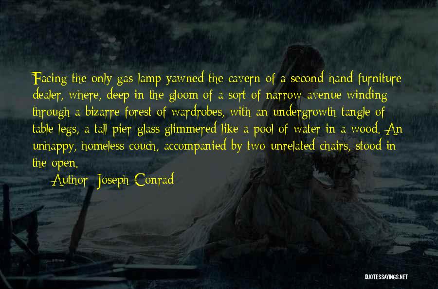 Joseph Conrad Quotes: Facing The Only Gas-lamp Yawned The Cavern Of A Second-hand Furniture Dealer, Where, Deep In The Gloom Of A Sort
