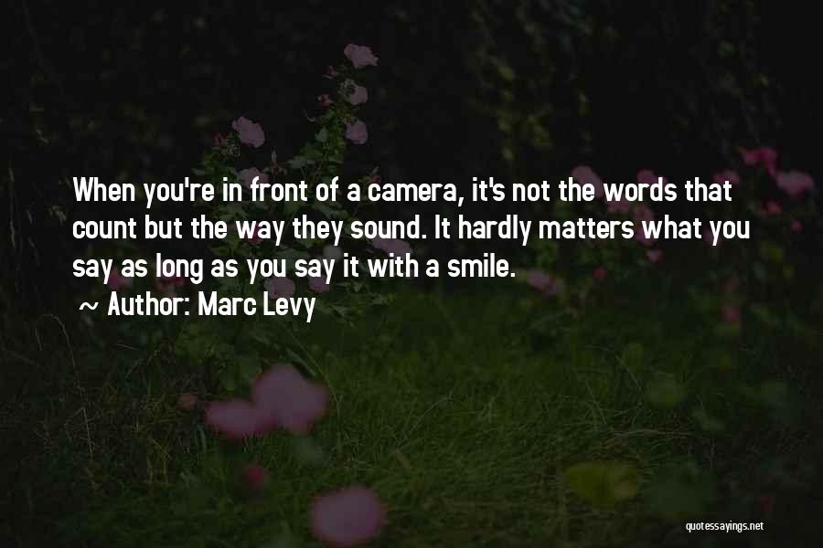 Camera And Smile Quotes By Marc Levy