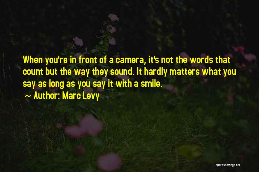 Smile On Camera Quotes By Marc Levy