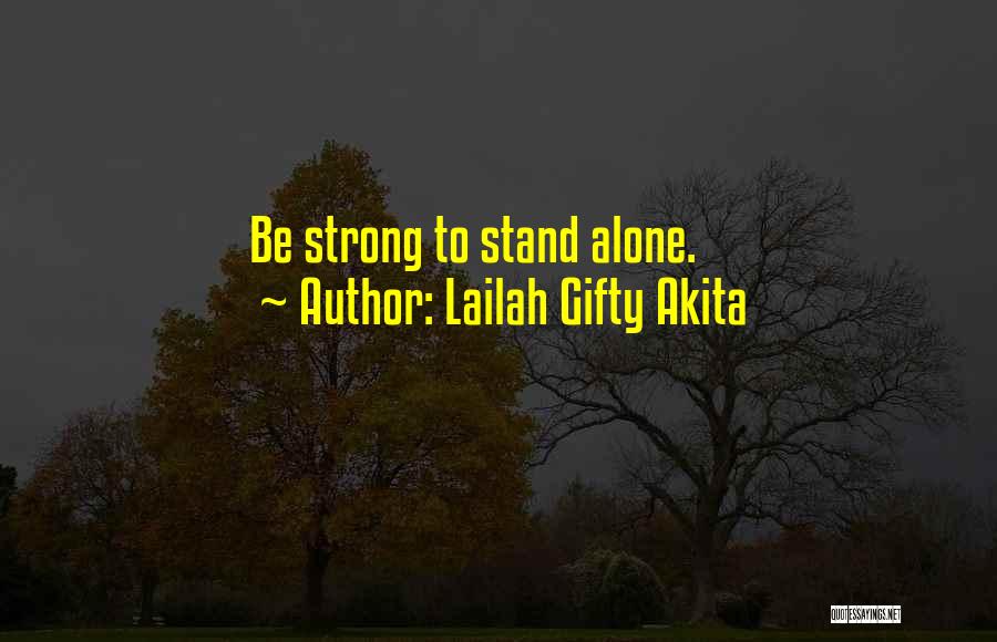 Strong Woman Alone Quotes By Lailah Gifty Akita